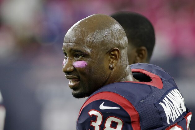 Houston Texans' Danieal Manning (38) warms up before an NFL football game against the Indianapolis Colts, Thursday, Oct. 9, 2014, in Houston. (AP Photo/David J. Phillip)