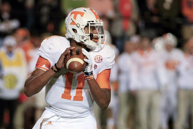 Tennessee quarterback Joshua Dobbs looks for a receiver in the third quarter of an NCAA college football game against Vanderbilt, Saturday, Nov. 29, 2014, in Nashville, Tenn. Tennessee won 24-17. (AP Photo/Mark Humphrey)