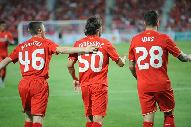 BANGKOK, THAILAND - JULY 14: (L-R) Jordan Rossiter, Lazar Markovic, and Danny Ings of Liverpool celebrate their goal during the international friendly match between Thai Premier League All Stars and Liverpool FC at Rajamangala Stadium on July 14, 2015 in Bangkok, Thailand.  (Photo by Robertus Pudyanto/Getty Images)