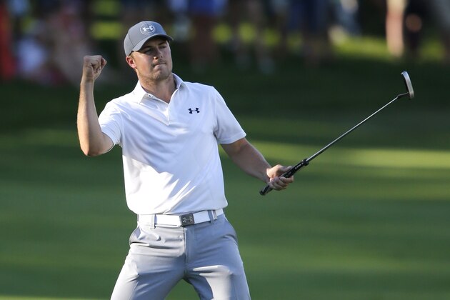 Jordan Spieth celebrates his birdie on the 18th green during the third round of the John Deere Classic golf tournament Saturday, July 11, 2015, in Silvis, Ill. (AP Photo/Charles Rex Arbogast) Jordan Spieth celebrates his birdie on the 18th green during the third round of the John Deere Classic golf tournament Saturday, July 11, 2015, in Silvis, Ill. (AP Photo/Charles Rex Arbogast)