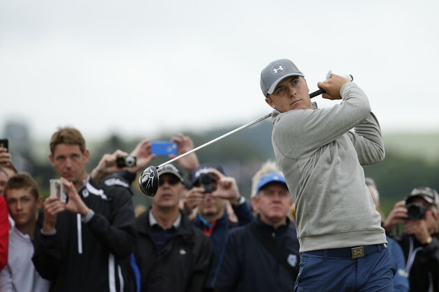 United States’ Jordan Spieth follows his drive from the fourth tee during a practice round at the British Open Golf Championship at the Old Course, St. Andrews, Scotland, Tuesday, July 14, 2015. (AP Photo/Jon Super)