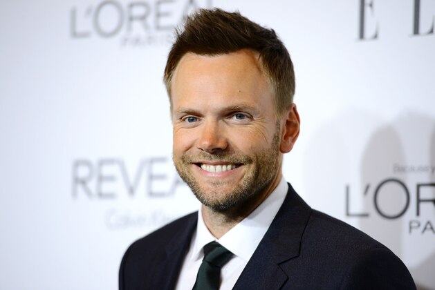 FILE - In this Monday, Oct. 20, 2014, file photo, actor and talk show host Joel McHale arrives at ELLE's 21st annual Women In Hollywood Awards at the Four Seasons Hotel, in Los Angeles. McHale is signed up to be host of the annual ESPY Awards show in July 2015. ESPN said Friday, May 22, 2015, the show will take place in the Nokia Theatre in Los Angeles. (Photo by Jordan Strauss/Invision/AP, File)