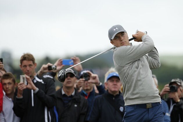 United States’ Jordan Spieth follows his drive from the fourth tee during a practice round at the British Open Golf Championship at the Old Course, St. Andrews, Scotland, Tuesday, July 14, 2015. (AP Photo/Jon Super)
