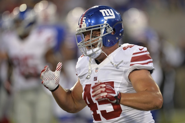New York Giants fullback Henry Hynoski (45) reacts against the Buffalo Bills during the Pro Football Hall of Fame exhibition NFL football game Sunday, Aug. 3, 2014, in Canton, Ohio. New York won 17-13. (AP Photo/David Richard) New York Giants fullback Henry Hynoski (45) reacts against the Buffalo Bills during the Pro Football Hall of Fame exhibition NFL football game Sunday, Aug. 3, 2014, in Canton, Ohio. New York won 17-13. (AP Photo/David Richard)