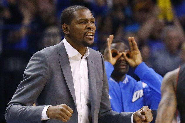 Injured Oklahoma City Thunder forward Kevin Durant reacts on the bench to a basket in the fourth quarter of an NBA basketball game against the Toronto Raptors in Oklahoma City, Sunday, March 8, 2015. Oklahoma City won 108-104. (AP Photo/Sue Ogrocki)