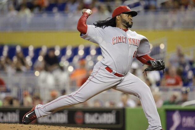 Cincinnati Reds starting pitcher Johnny Cueto throws in the first inning of a baseball game against the Miami Marlins, Sunday, July 12, 2015, in Miami. (AP Photo/Lynne Sladky)