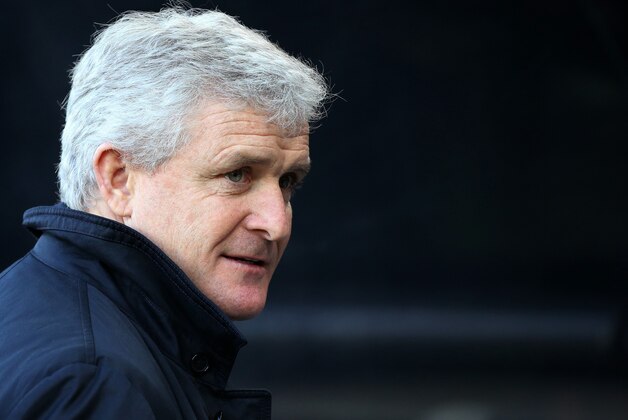 Stoke City's manager Mark Hughes awaits the start of their English Premier League soccer match between Newcastle United and Stoke City at St James' Park, Newcastle, England, Sunday, Feb. 8, 2015. (AP Photo/Scott Heppell)