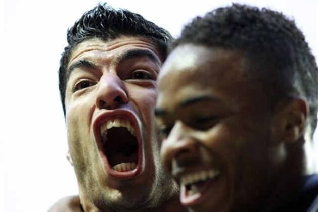 Liverpool's Luis Suarez, left, celebrates his goal with Raheem Sterling during their English Premier League soccer match against Sunderland at the Stadium of Light, Sunderland, England, Saturday, Sept. 15, 2012. (AP Photo/Scott Heppell) Liverpool's Luis Suarez, left, celebrates his goal with Raheem Sterling during their English Premier League soccer match against Sunderland at the Stadium of Light, Sunderland, England, Saturday, Sept. 15, 2012. (AP Photo/Scott Heppell)
