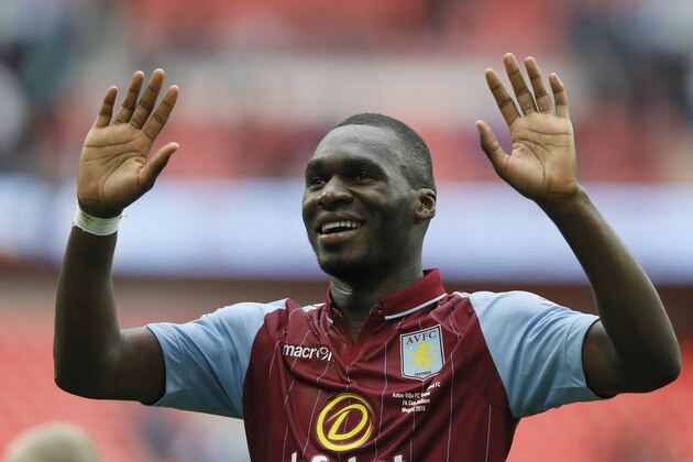 Aston Villa’s Christian Benteke celebrates after the end of the  English FA Cup semifinal soccer match between Liverpool and  Aston Villa at Wembley Stadium in London, Sunday, April 19, 2015. Aston Villa won the game 2-1.(AP Photo/Kirsty Wigglesworth)