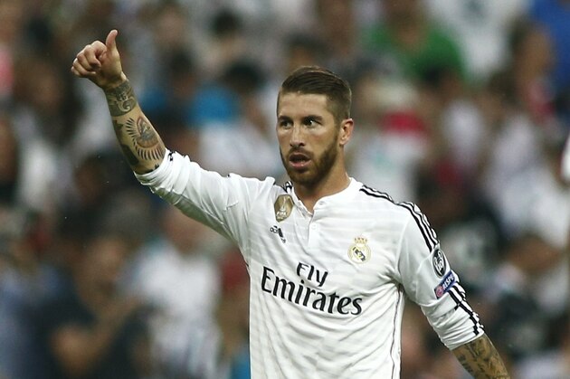 Real Madrid's Sergio Ramos reacts during the Champions League second leg semifinal soccer match between Real Madrid and Juventus, at the Santiago Bernabeu stadium in Madrid, Wednesday, May 13, 2015.  (AP Photo/Oscar del Pozo)