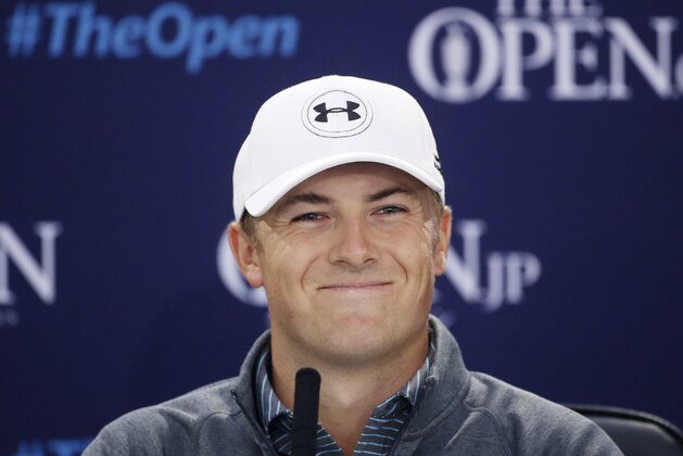United States’ Jordan Spieth smiles during a news conference ahead of a practice round at the British Open Golf Championship at the Old Course, St. Andrews, Scotland, Wednesday, July 15, 2015. (AP Photo/Peter Morrison)