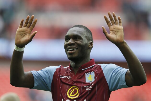 Aston Villa’s Christian Benteke celebrates after the end of the  English FA Cup semifinal soccer match between Liverpool and  Aston Villa at Wembley Stadium in London, Sunday, April 19, 2015. Aston Villa won the game 2-1.(AP Photo/Kirsty Wigglesworth)