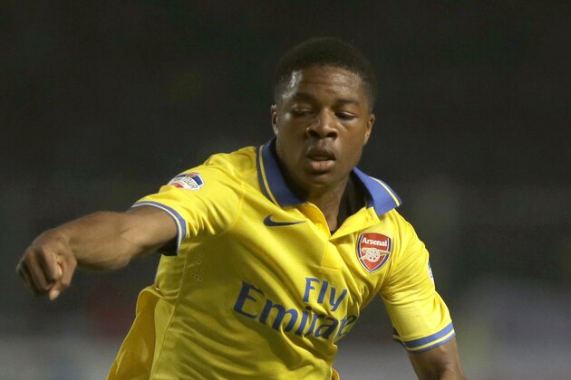 Arsenal's Chuba Akpom controls the ball during a friendly soccer match against Indonesia Dream Team at Gelora Bung Karno stadium Sunday, July 14, 2013 in Jakarta, Indonesia. Arsenal won the match 7-0. (AP Photo/Dita Alangkara)