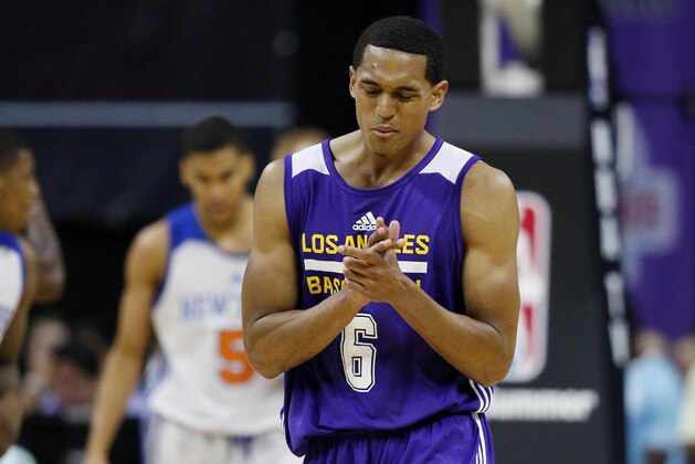 Los Angeles Lakers’ Jordan Clarkson reacts after a play against the New York Knicks during the second half of an NBA summer league basketball game Monday, July 13, 2015, in Las Vegas. (AP Photo/John Locher)