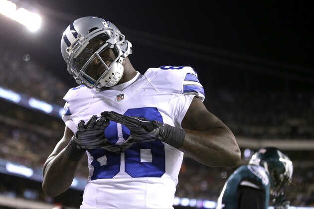 Dallas Cowboys' Dez Bryant (88) reacts after scoring a touchdown during the first half of an NFL football game against the Philadelphia Eagles, Sunday, Dec. 14, 2014, in Philadelphia. (AP Photo/Matt Rourke)