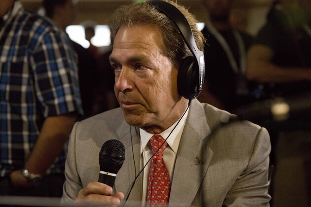 Alabama coach Nick Saban speaks to the media during a radio interview at the Southeastern Conference NCAA college football media days, Wednesday, July 15, 2015, in Hoover, Ala. (AP Photo/Brynn Anderson)