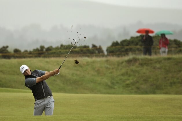 United States’ Jordan Spieth plays a shot on the sixth hole during a practice round at the British Open Golf Championship at the Old Course, St. Andrews, Scotland, Wednesday, July 15, 2015. (AP Photo/David J. Phillip)