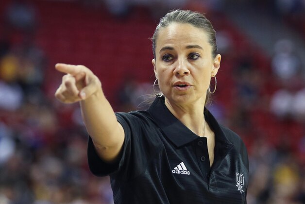 Becky Hammon coaches the San Antonio Spurs during an NBA summer league basketball game against the New York Knicks on Saturday, July 11, 2015, in Las Vegas. (AP Photo/Ronda Churchill)