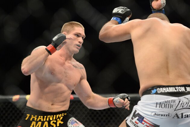 Dec 6, 2014; Las Vegas, NV, USA; Todd Duffee (red) and Anthony Hamilton (blue) fight during UFC 181 at Madalay Bay Events Center. Duffee won via first round knockout. Mandatory Credit: Joe Camporeale-USA TODAY Sports