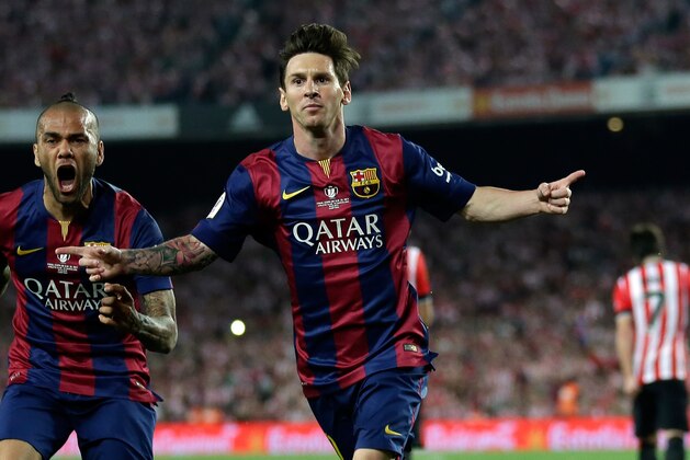 Barcelona's Lionel Messi celebrates after scoring the opening goal during the final of the Copa del Rey soccer match between FC Barcelona and Athletic Bilbao at the Camp Nou stadium in Barcelona, Spain, Saturday, May 30, 2015. (AP Photo/Manu Fernandez)
