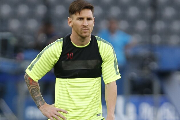Barcelona's Lionel Messi pauses during a training session at the Olympic stadium in Berlin Friday, June 5, 2015 on the eve of the soccer Champions League final between Juventus Turin and FC Barcelona on Saturday. (AP Photo/Luca Bruno) Barcelona's Lionel Messi pauses during a training session at the Olympic stadium in Berlin Friday, June 5, 2015 on the eve of the soccer Champions League final between Juventus Turin and FC Barcelona on Saturday. (AP Photo/Luca Bruno)