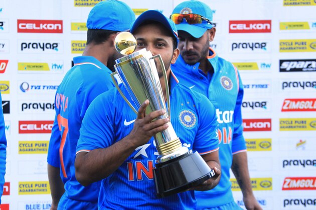 Indian  player Kedar Jadhav kisses the trophy at the end of the One Day International cricket match series against Zimbabwe  in  Harare, Zimbabwe, Tuesday, July 14, 2015.    (AP Photo/Tsvangirayi Mukwazhi)