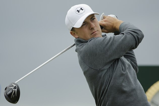 United States’ Jordan Spieth drives a ball from the fifth tee during the first round of the British Open Golf Championship at the Old Course, St. Andrews, Scotland, Thursday, July 16, 2015. (AP Photo/David J. Phillip)