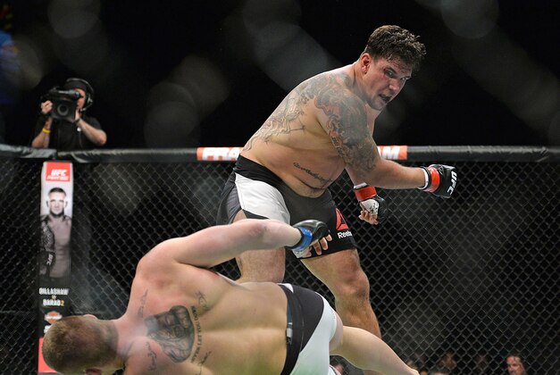 Jul 15, 2015; San Diego, CA, USA; Frank Mir (red) knocks out Todd Duffee (blue) in the first round during UFC Fight Night at Valley View Casino Center. Mandatory Credit: Jake Roth-USA TODAY Sports