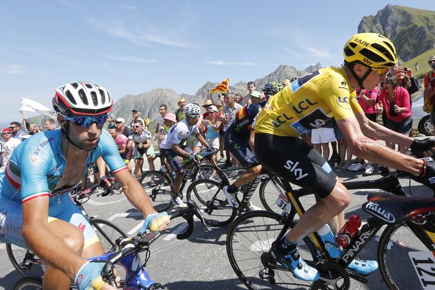 Italy's Vincenzo Nibali, Colombia's Nairo Quintana, wearing the best young rider's white jersey, Spain's Alejandro Valverde and Britain's Christopher Froome, wearing the overall leader's yellow jersey, from left to right, climb Tourmalet pass during the eleventh stage of the Tour de France cycling race over 188 kilometers (116.8 miles) with start in Pau and finish in Cauterets, France, Wednesday, July 15, 2015. (AP Photo/Christophe Ena) Italy's Vincenzo Nibali, Colombia's Nairo Quintana, wearing the best young rider's white jersey, Spain's Alejandro Valverde and Britain's Christopher Froome, wearing the overall leader's yellow jersey, from left to right, climb Tourmalet pass during the eleventh stage of the Tour de France cycling race over 188 kilometers (116.8 miles) with start in Pau and finish in Cauterets, France, Wednesday, July 15, 2015. (AP Photo/Christophe Ena)