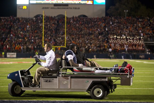 Mississippi wide receiver Laquon Treadwell (1) is taken off the field after being injured during the end of the second half of an NCAA college football game, Saturday, Nov. 1, 2014, in Oxford, Miss. Treadwell fumbled the ball at the Auburn goal line. Auburn won 35-31. (AP Photo/Brynn Anderson)