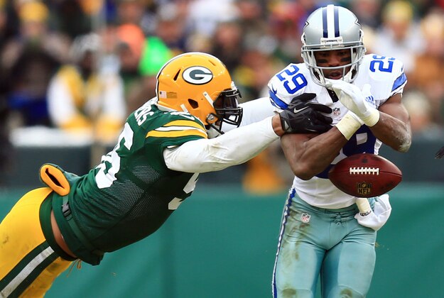 Jan 11, 2015; Green Bay, WI, USA; Dallas Cowboys running back DeMarco Murray (29) fumbles the ball as he is hit by Green Bay Packers outside linebacker Julius Peppers (56) in the third quarter in the second half in the 2014 NFC Divisional playoff football game at Lambeau Field. Mandatory Credit: Andrew Weber-USA TODAY Sports Jan 11, 2015; Green Bay, WI, USA; Dallas Cowboys running back DeMarco Murray (29) fumbles the ball as he is hit by Green Bay Packers outside linebacker Julius Peppers (56) in the third quarter in the second half in the 2014 NFC Divisional playoff football game at Lambeau Field. Mandatory Credit: Andrew Weber-USA TODAY Sports