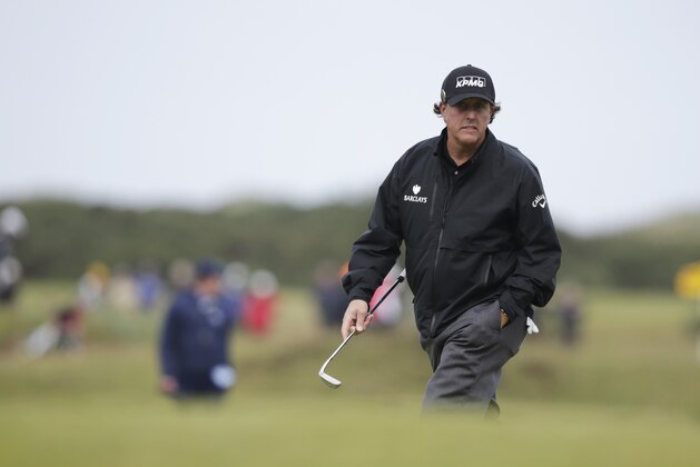 United States’ Phil Mickelson walks to the 12th green during the first round of the British Open Golf Championship at the Old Course, St. Andrews, Scotland, Thursday, July 16, 2015. (AP Photo/Alastair Grant)