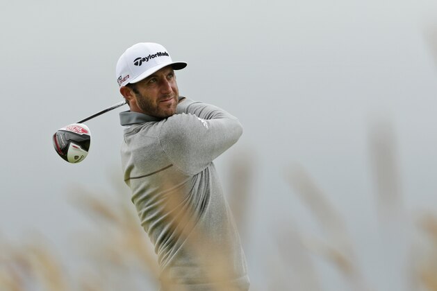 United States’ Dustin Johnson drives the ball from the 15th tee during the first round of the British Open Golf Championship at the Old Course, St. Andrews, Scotland, Thursday, July 16, 2015. (AP Photo/David J. Phillip)
