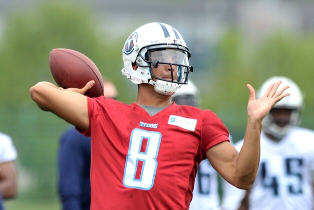 May 26, 2015; Nashville, TN, USA; Tennessee Titans first round draft pick quarterback Marcus Mariota (8) passes during OTA drills at Saint Thomas Sports Park. Mandatory Credit: Jim Brown-USA TODAY Sports