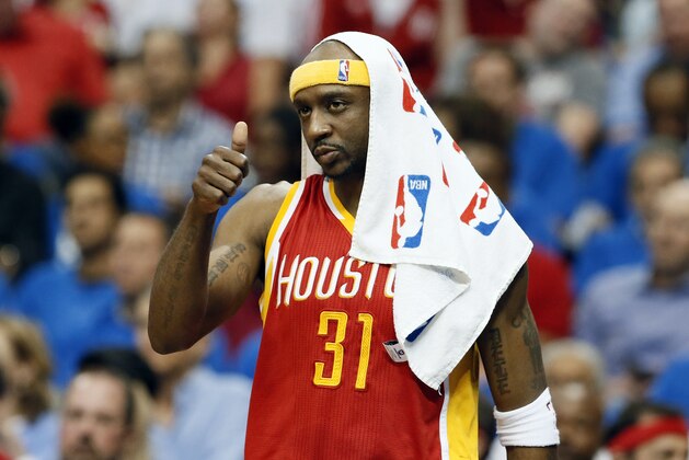 Houston Rockets' Jason Terry (31) gives a thumbs up to a teammate on the court after a Rockets basket against the Dallas Mavericks in the first half of Game 4 in an NBA basketball first-round playoff series Sunday April 26, 2015, in Dallas. (AP Photo/Tony Gutierrez)