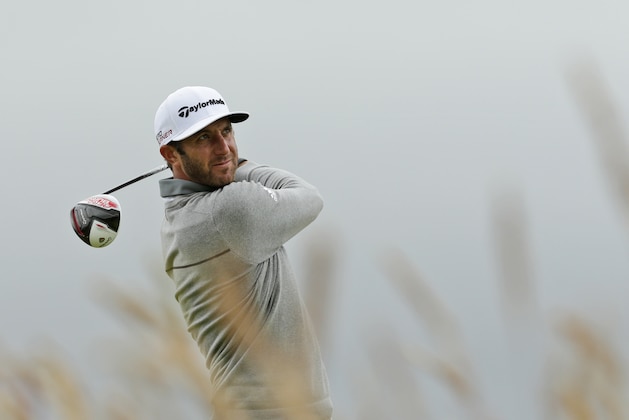 United States’ Dustin Johnson drives the ball from the 15th tee during the first round of the British Open Golf Championship at the Old Course, St. Andrews, Scotland, Thursday, July 16, 2015. (AP Photo/David J. Phillip)