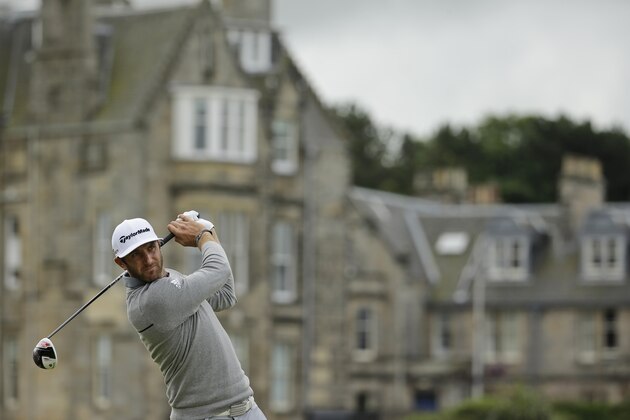 United States’ Dustin Johnson follows his drive from the second tee during the first round of the British Open Golf Championship at the Old Course, St. Andrews, Scotland, Thursday, July 16, 2015. (AP Photo/David J. Phillip)
