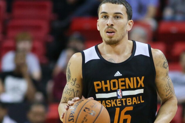 Phoenix Suns' Mike James dribbles the ball during the first half of an NBA summer league basketball game against Utah Jazz Tuesday, July 14, 2015, in Las Vegas. Phoenix Suns won 91-82. (AP Photo/Ronda Churchill)