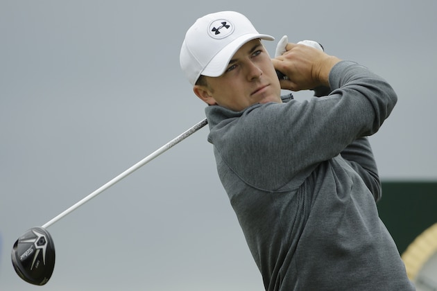 United States’ Jordan Spieth drives a ball from the fifth tee during the first round of the British Open Golf Championship at the Old Course, St. Andrews, Scotland, Thursday, July 16, 2015. (AP Photo/David J. Phillip)