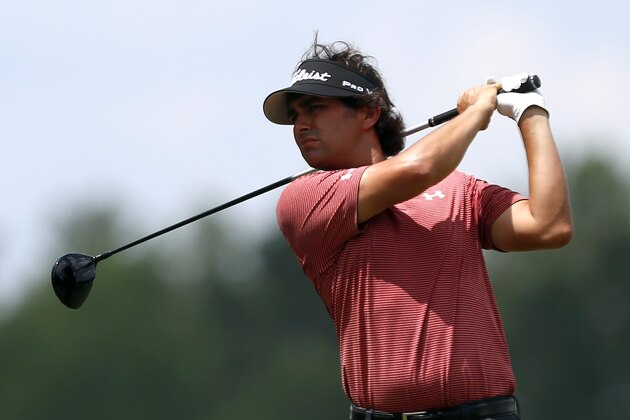 Martin Flores tees off on the 18th hole during the first round of the Barbasol Championship golf tournament Thursday, July 16, 2015, in Opelika, Ala. (AP Photo/Butch Dill)