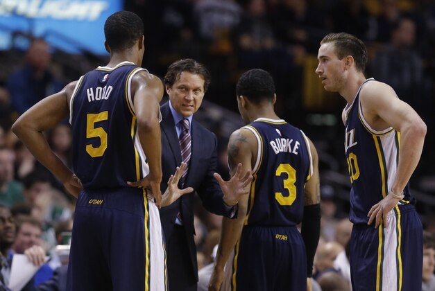 Utah Jazz head coach Quin Snyder talks to guard Rodney Hood (5), guard Trey Burke (3) and forward Gordon Hayward (20) during the second half of an NBA basketball game against the Boston Celtics in Boston, Wednesday, March 4, 2015. The Celtics won 85-84. (AP Photo/Elise Amendola) Utah Jazz head coach Quin Snyder talks to guard Rodney Hood (5), guard Trey Burke (3) and forward Gordon Hayward (20) during the second half of an NBA basketball game against the Boston Celtics in Boston, Wednesday, March 4, 2015. The Celtics won 85-84. (AP Photo/Elise Amendola)