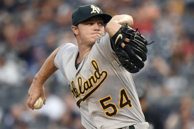 Oakland Athletics pitcher Sonny Gray delivers the ball to the New York Yankees during the first inning of a baseball game Tuesday, July 7, 2015, at Yankee Stadium in New York. (AP Photo/Bill Kostroun)