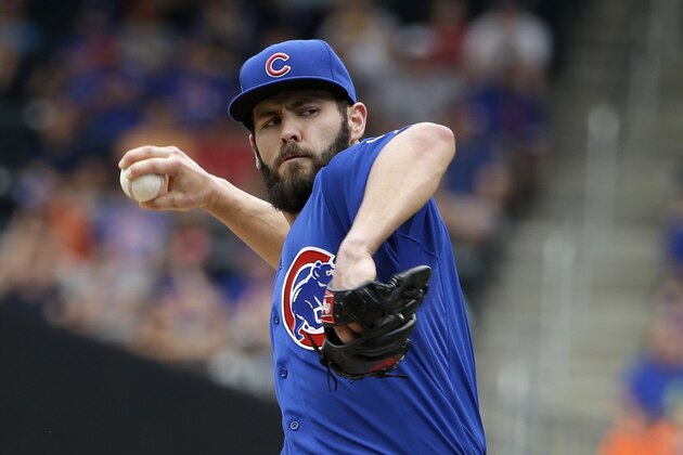 Chicago Cubs starting pitcher Jake Arrieta throws during the second inning of the baseball game against the New York Mets at Citi Field, Thursday, July 2, 2015 in New York. (AP Photo/Seth Wenig)