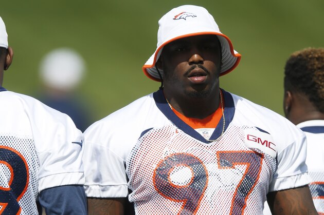 Denver Broncos defensive end Malik Jackson warms up during the NFL football team's voluntary veterans minicamp Tuesday, April 28, 2015, in Englewood, Colo. (AP Photo/David Zalubowski)