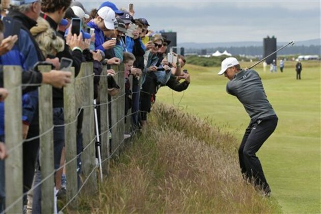 United States’ Jordan Spieth plays from the rough on hole 16 during a practice round at the British Open Golf Championship at the Old Course, St. Andrews, Scotland, Wednesday, July 15, 2015. (AP Photo/David J. Phillip)