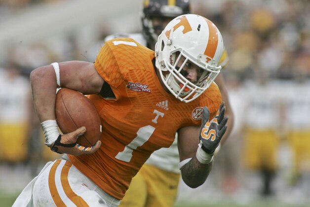 Jan 2, 2015; Jacksonville, FL, USA; Tennessee Volunteers running back Jalen Hurd (1) runs for a 29-yard touchdown in the first quarter of their 2015 TaxSlayer Bowl against the Iowa Hawkeyes at EverBank Field. Mandatory Credit: Phil Sears-USA TODAY Sports