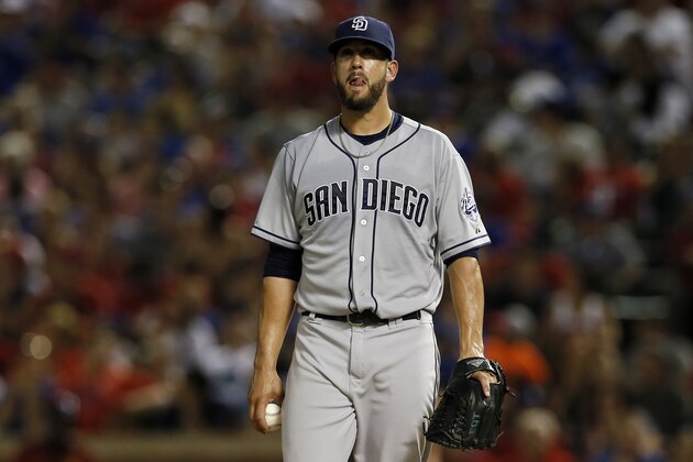 San Diego Padres' James Shields pauses between pitches to the Texas Rangers in the fifth inning of an interleague baseball game Saturday, July 11, 2015, in Arlington, Texas. (AP Photo/Tony Gutierrez)
