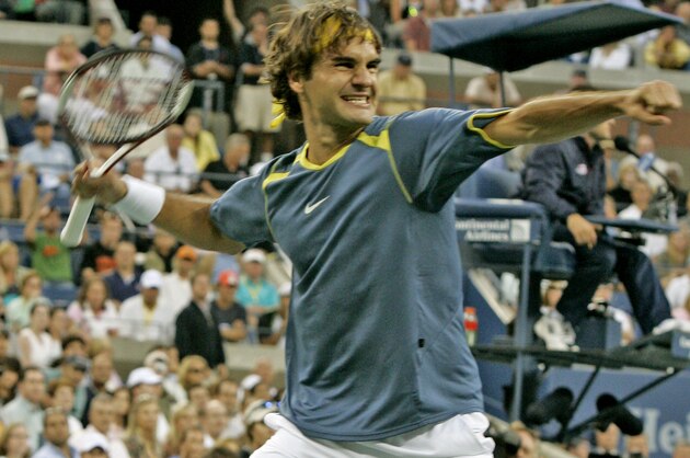 Roger Federer of Switzerland reacts after winning the mens final against Andre Agassi of the United States, at the US Open tennis tournament in New York, Sunday, Sept. 11, 2005. Federer won 6-3, 2-6, 7-6 (1), 6-1. (AP Photo/Richard Drew)