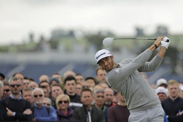 United States’ Dustin Johnson drives a ball from the fourth tee during the first round of the British Open Golf Championship at the Old Course, St. Andrews, Scotland, Thursday, July 16, 2015. (AP Photo/David J. Phillip)
