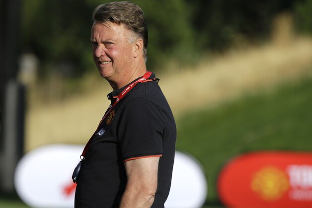 Manchester United manager Louis van Gaal stands on the field during training Thursday, July 16, 2015, in Renton, Wash. Manchester United is in the area for an international friendly soccer match against Mexico's Club America on Friday in Seattle. (AP Photo/Ted S. Warren)